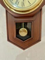 The Antique Attraction-Vintage Wooden Pendulum Wall Clock with Roman Numerals - Image 4