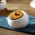 OLWICK Ceramic Condiment Pots Set of 3 with Bamboo Lids & Spoons, Spice Jar Containers with Wooden Tray, White - Image 9